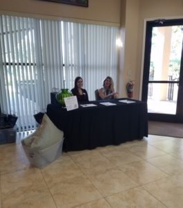 Jessica and Abbey running the Registration booth at the 'Bringing High Point Home' Seminar on October 20th, 2016