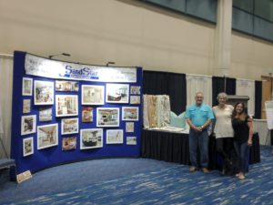 Tom, Olena and Cheryl setting up for the Home Show on January 20th, 2017